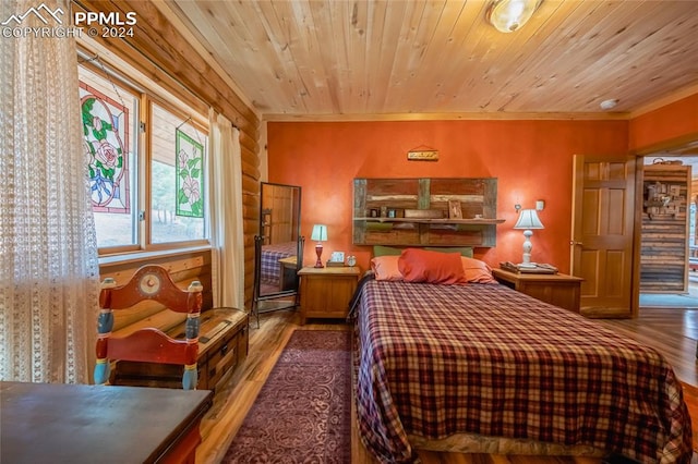 bedroom featuring wooden ceiling and hardwood / wood-style floors