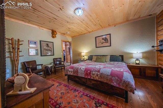 bedroom with wood ceiling and dark wood-type flooring