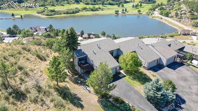 drone / aerial view with a water view