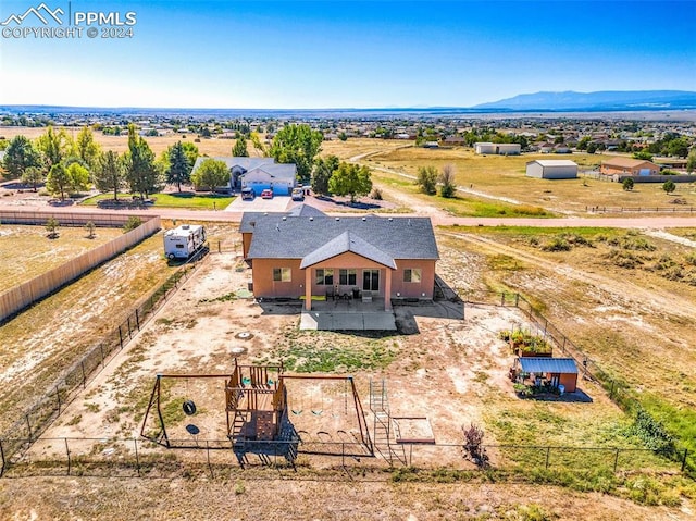 bird's eye view with a rural view and a mountain view