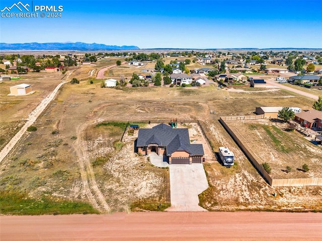 bird's eye view with a mountain view