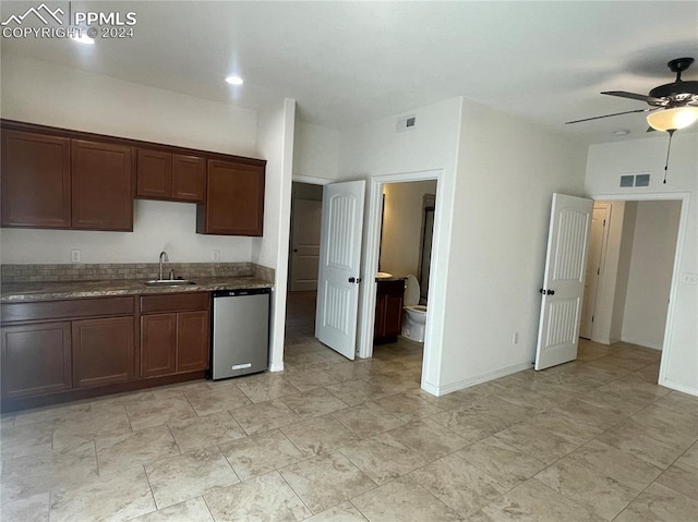 kitchen with dark brown cabinetry, dishwasher, ceiling fan, and sink