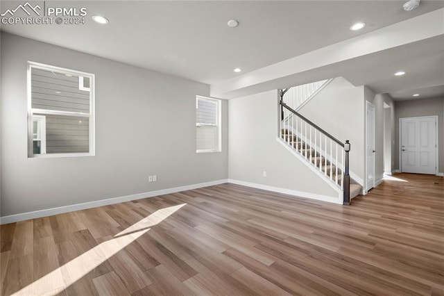 spare room with light hardwood / wood-style floors