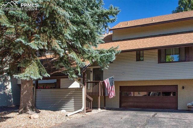 view of front of property with a garage