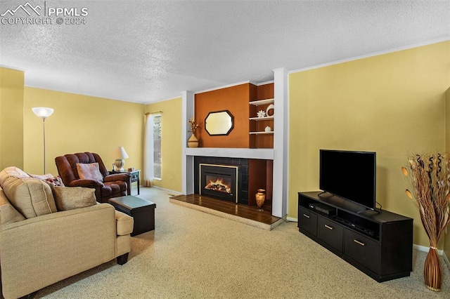 carpeted living room with a textured ceiling and a tiled fireplace