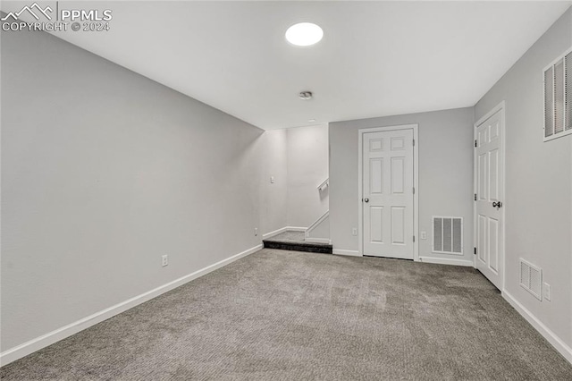 unfurnished room featuring carpet floors