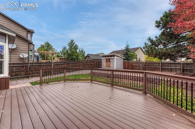 deck with a storage shed