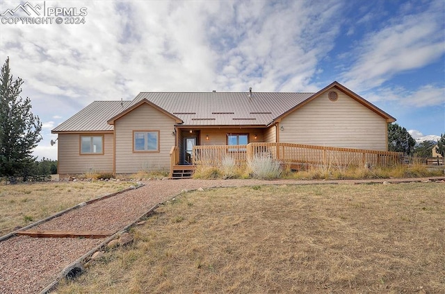 ranch-style house with a front yard