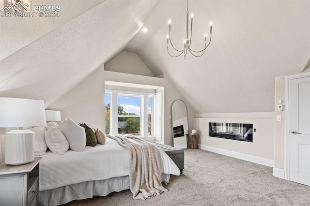 bedroom featuring a notable chandelier, vaulted ceiling, a textured ceiling, and carpet flooring