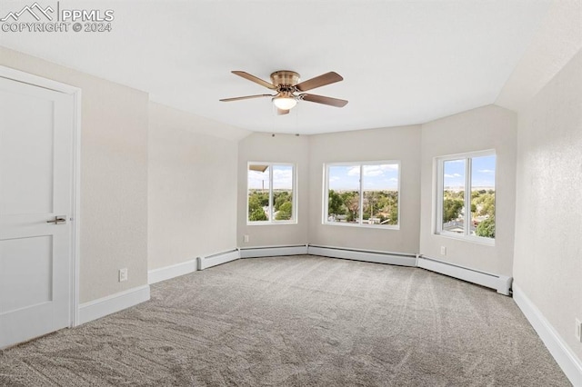 spare room featuring carpet floors, lofted ceiling, and ceiling fan