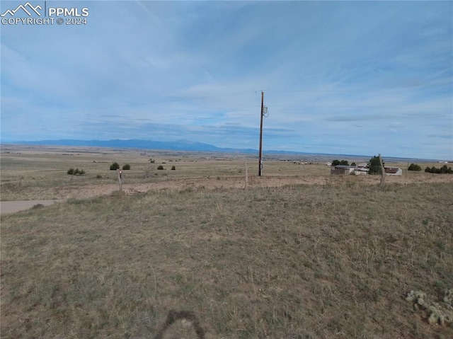 view of mountain feature featuring a rural view