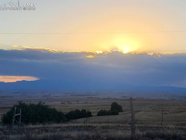 property view of mountains featuring a rural view