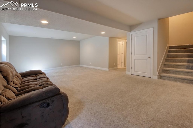 living room featuring light colored carpet