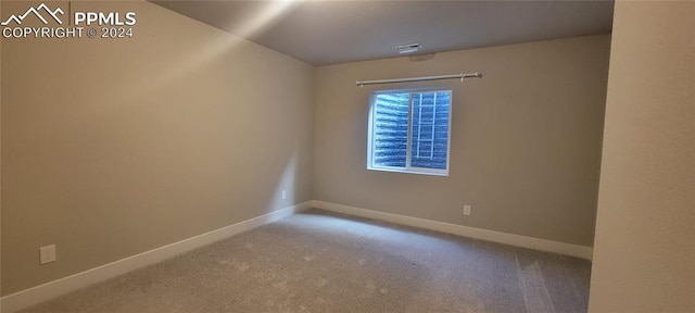 view of carpeted spare room