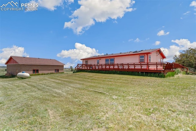 view of yard featuring a deck