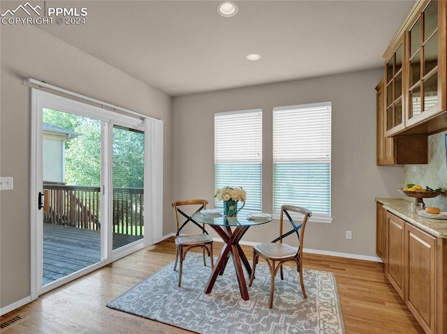 dining room featuring light hardwood / wood-style flooring