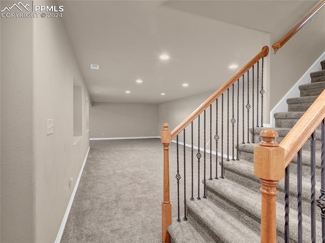 stairway with carpet floors