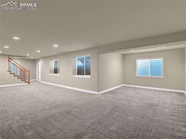 empty room featuring carpet floors