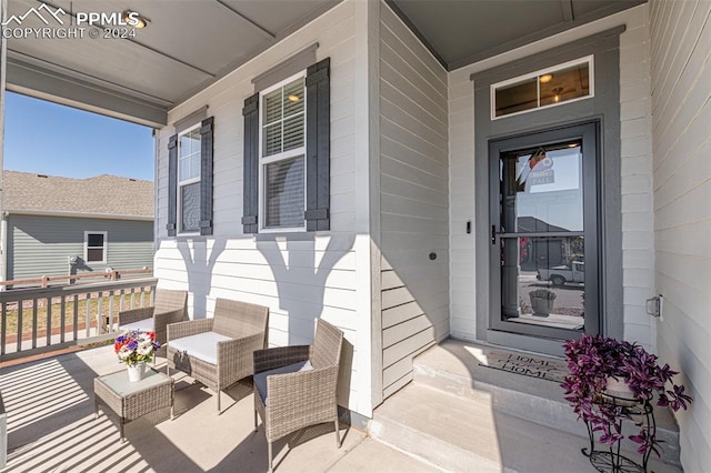 property entrance featuring a porch