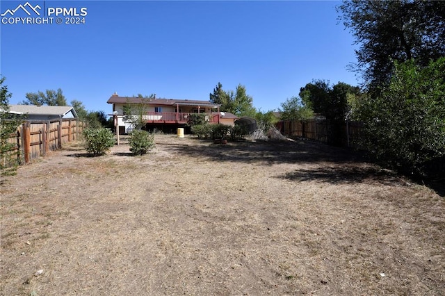 view of yard featuring a deck