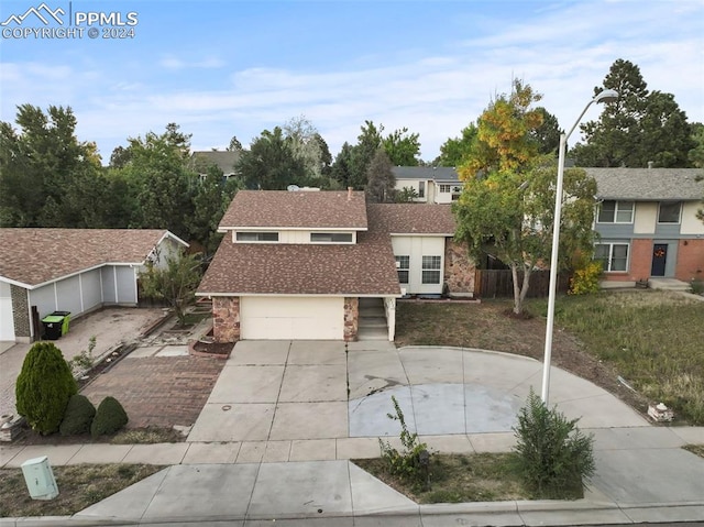 view of front of property with a garage