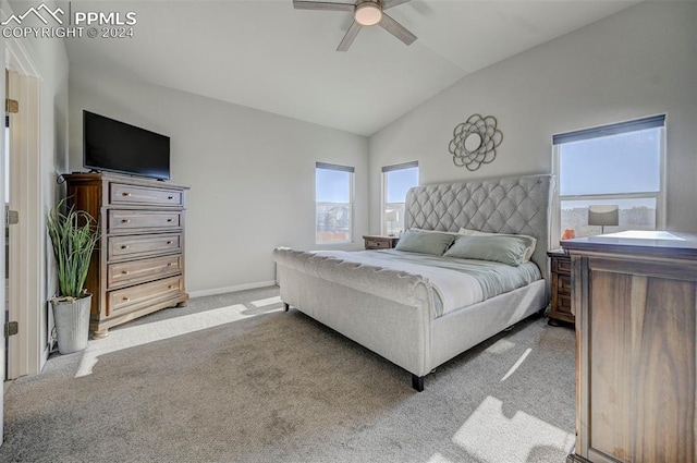 carpeted bedroom with lofted ceiling and ceiling fan