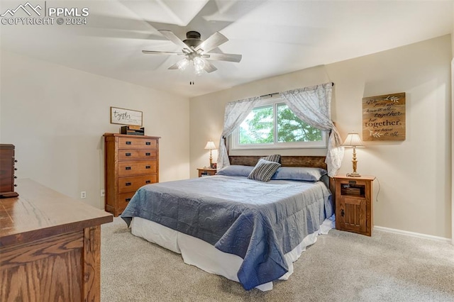 carpeted bedroom featuring ceiling fan