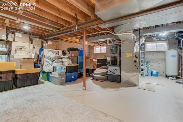 basement featuring heating unit