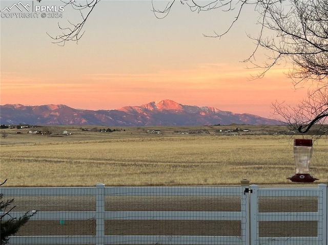 property view of mountains with a rural view