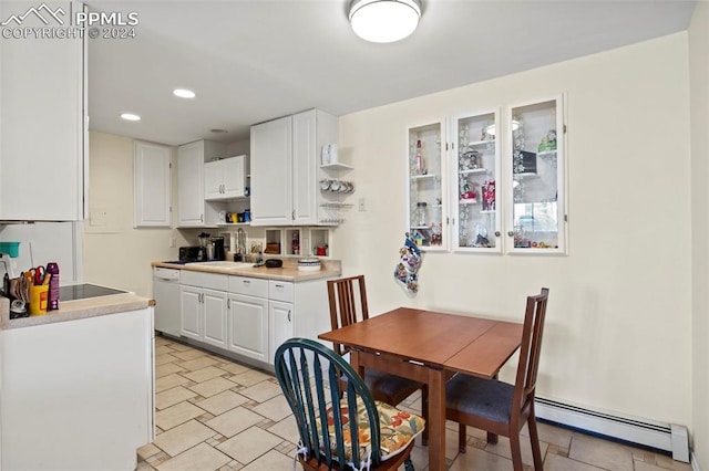 kitchen featuring white dishwasher, a baseboard heating unit, white cabinetry, and sink