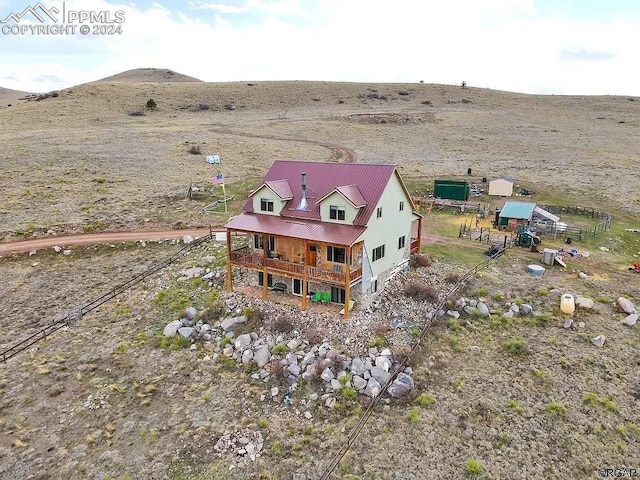 bird's eye view with a mountain view