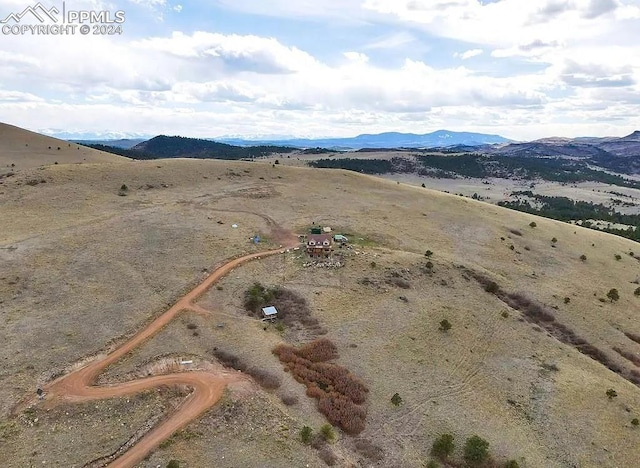 bird's eye view with a mountain view