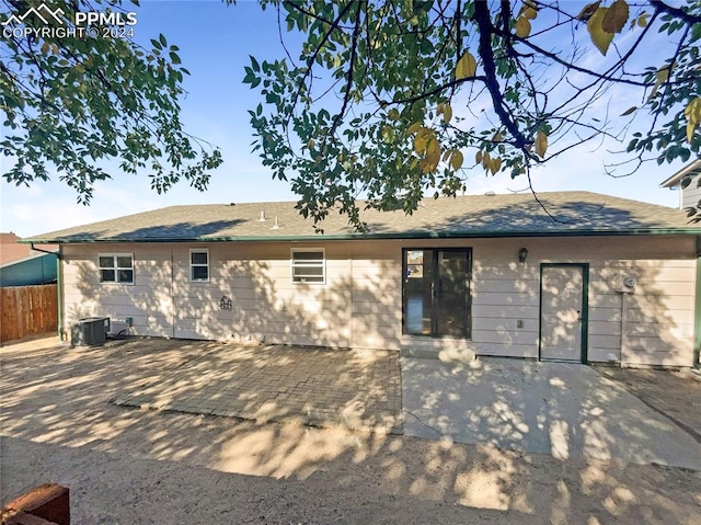 back of house featuring a patio and central AC unit