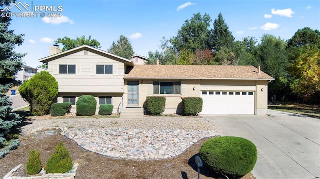 tri-level home featuring a garage