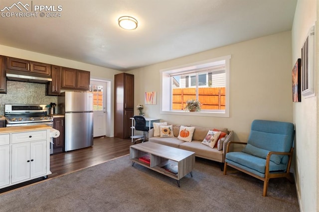 living room featuring dark hardwood / wood-style floors