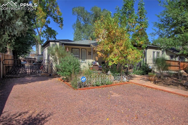 view of property hidden behind natural elements