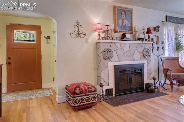 living room featuring plenty of natural light and hardwood / wood-style floors