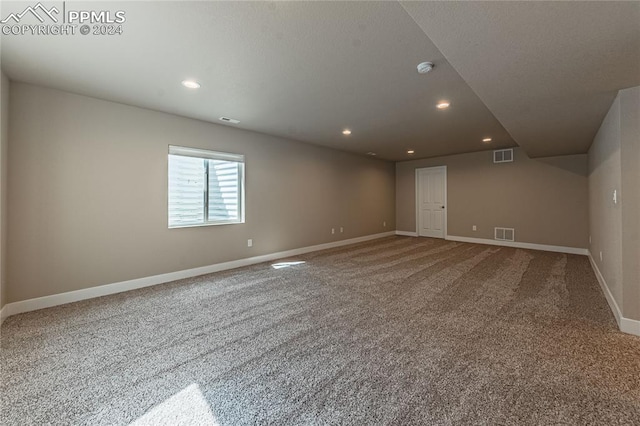 spare room with carpet flooring