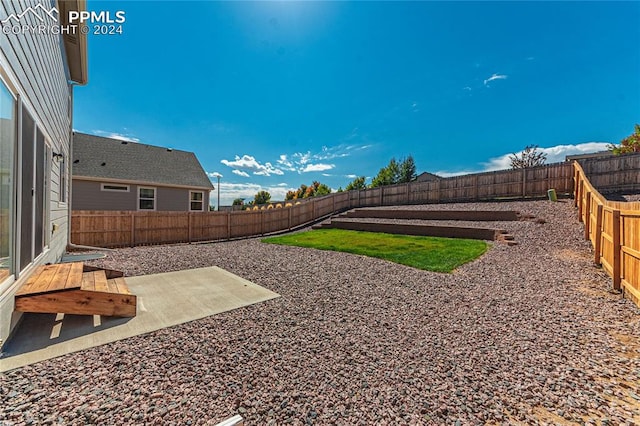 view of yard featuring a patio