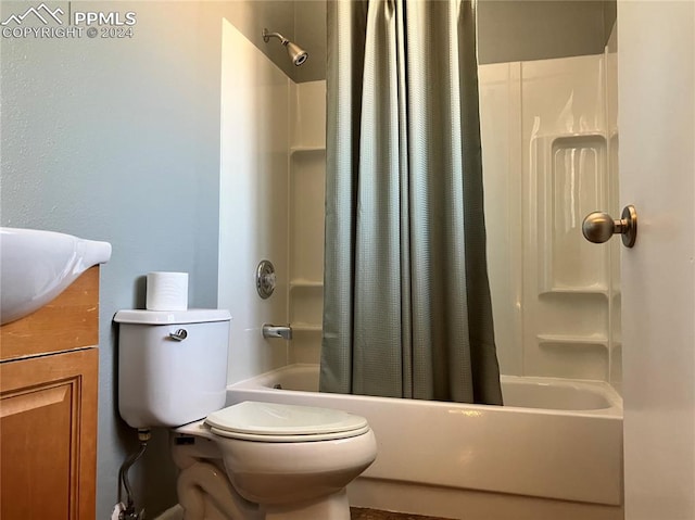 full bathroom with vanity, shower / bathtub combination with curtain, and toilet