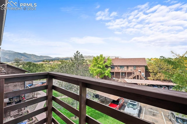 balcony featuring a mountain view