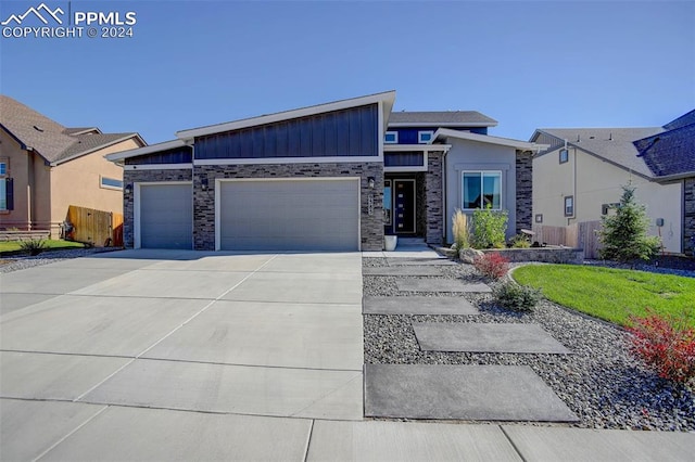 view of front of property with a garage