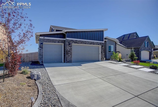 ranch-style home with a garage