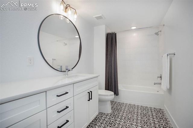 full bathroom with tile patterned flooring, shower / bath combo, vanity, and toilet