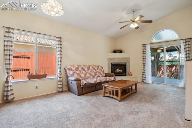 carpeted living room featuring lofted ceiling and ceiling fan