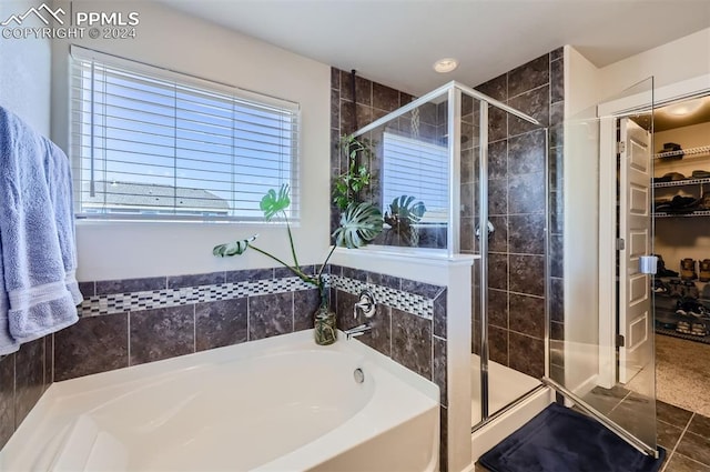 bathroom with plus walk in shower and tile patterned floors