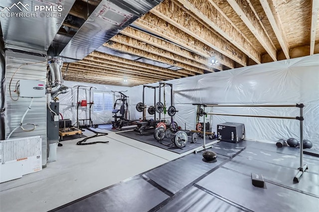 workout area featuring concrete flooring