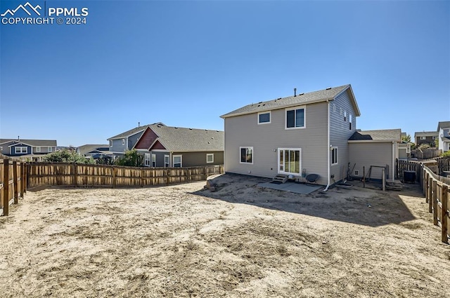 rear view of property with a patio