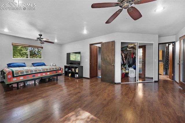 bedroom with ceiling fan and dark wood-type flooring