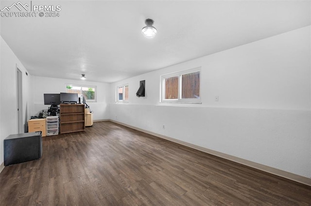 living room with dark hardwood / wood-style floors